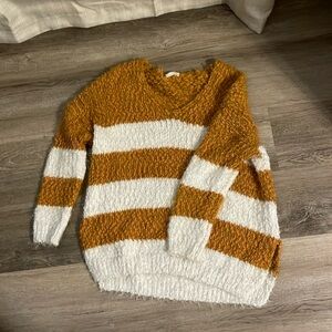 Yellow and white striped fuzzy sweater